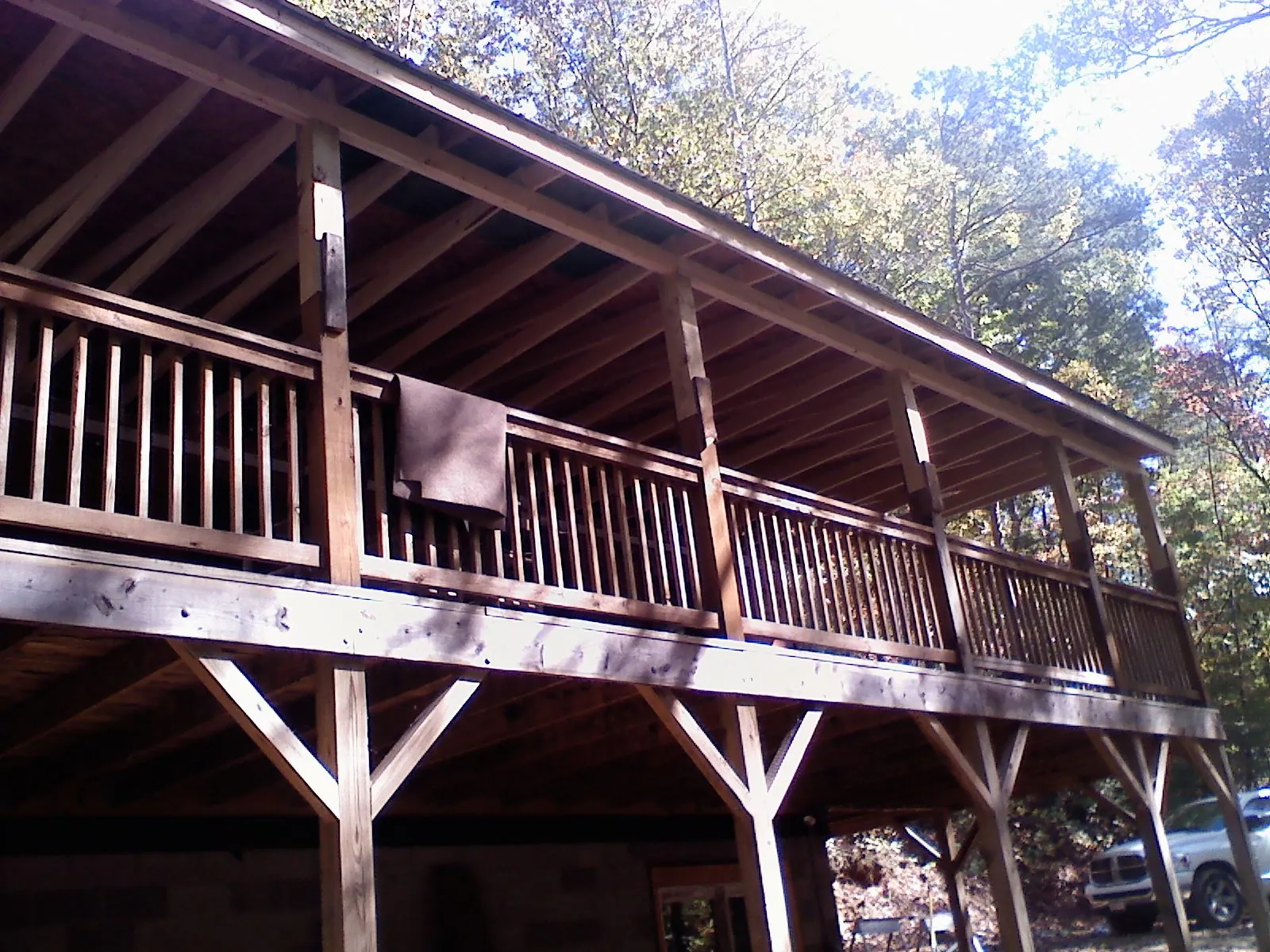 Timber framing under a new elevated porch and deck — Roof Leak Repair in Pitsburg by Roofing Brothers